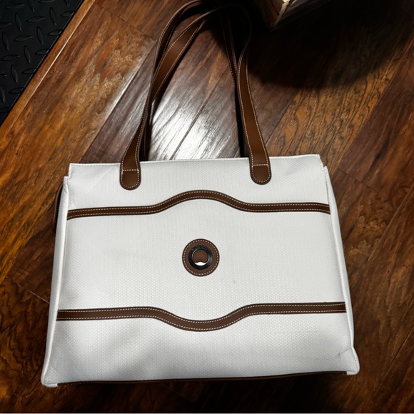 Delsey Paris Handbags - Delsey Paris travel bag